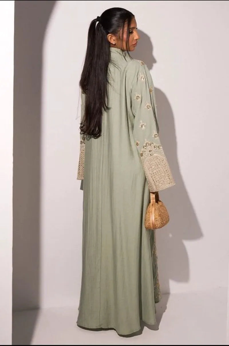 Abaya verte à sequins dorés et broderies