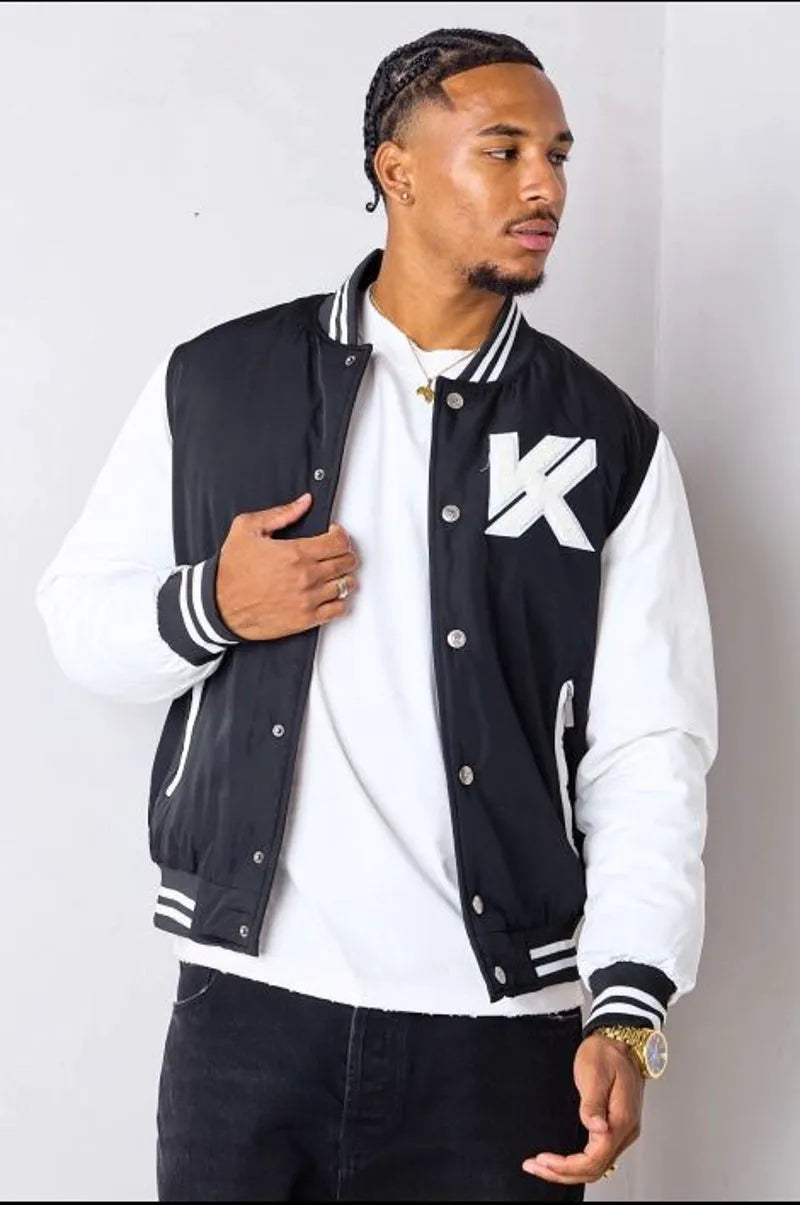 Short black and white quilted bomber jacket