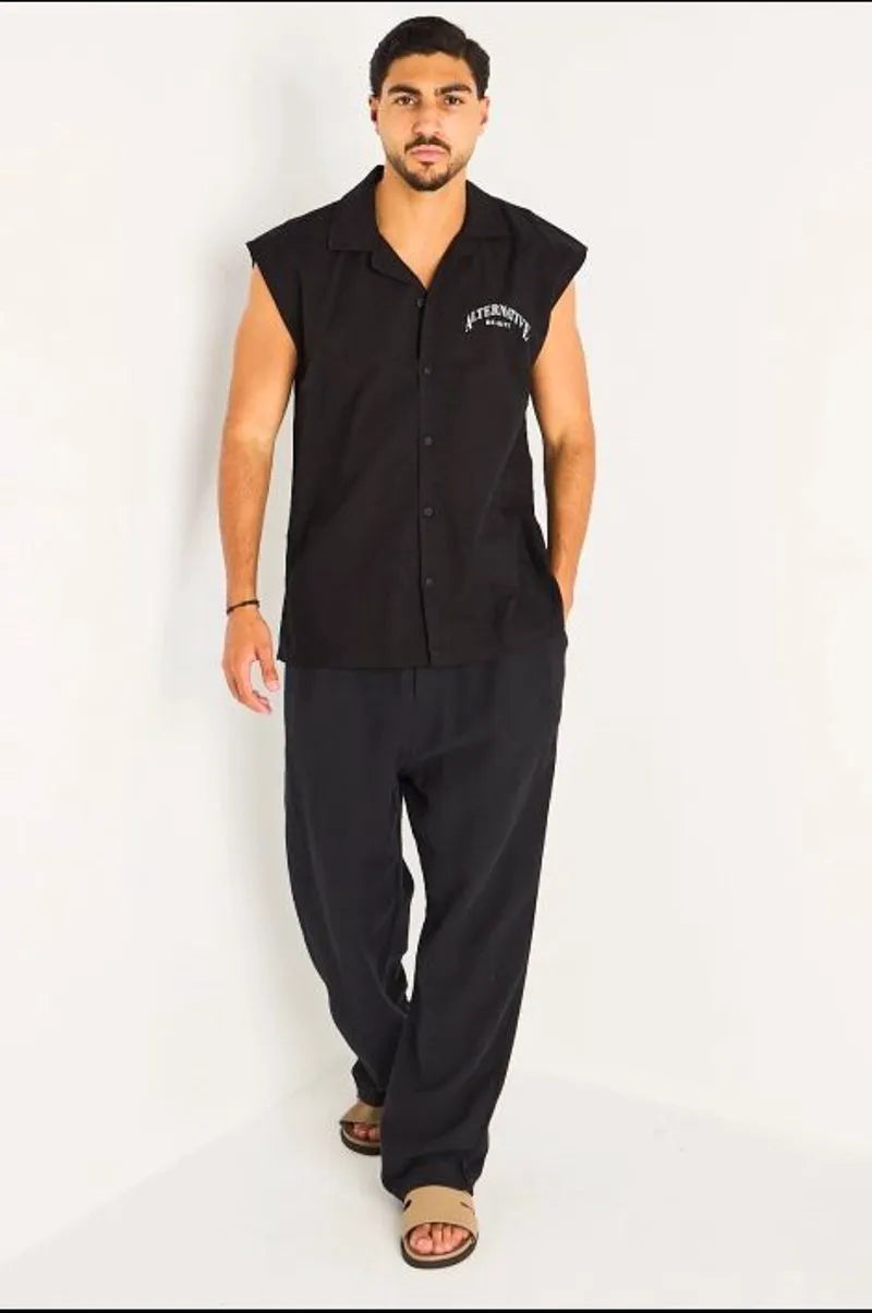 Chemise noire sans manches à inscriptions et empiècement étoile