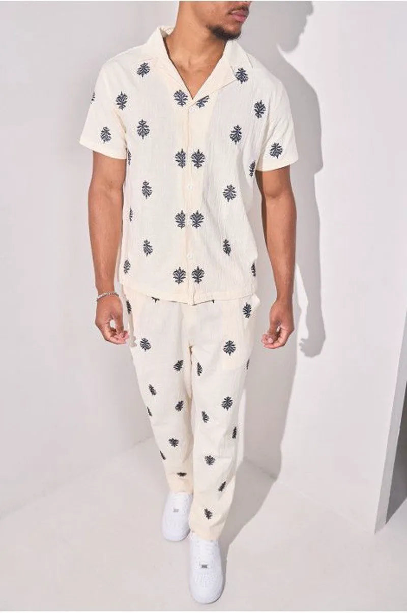 Two-piece ensemble with embroidered linen-effect shirt and beige trousers