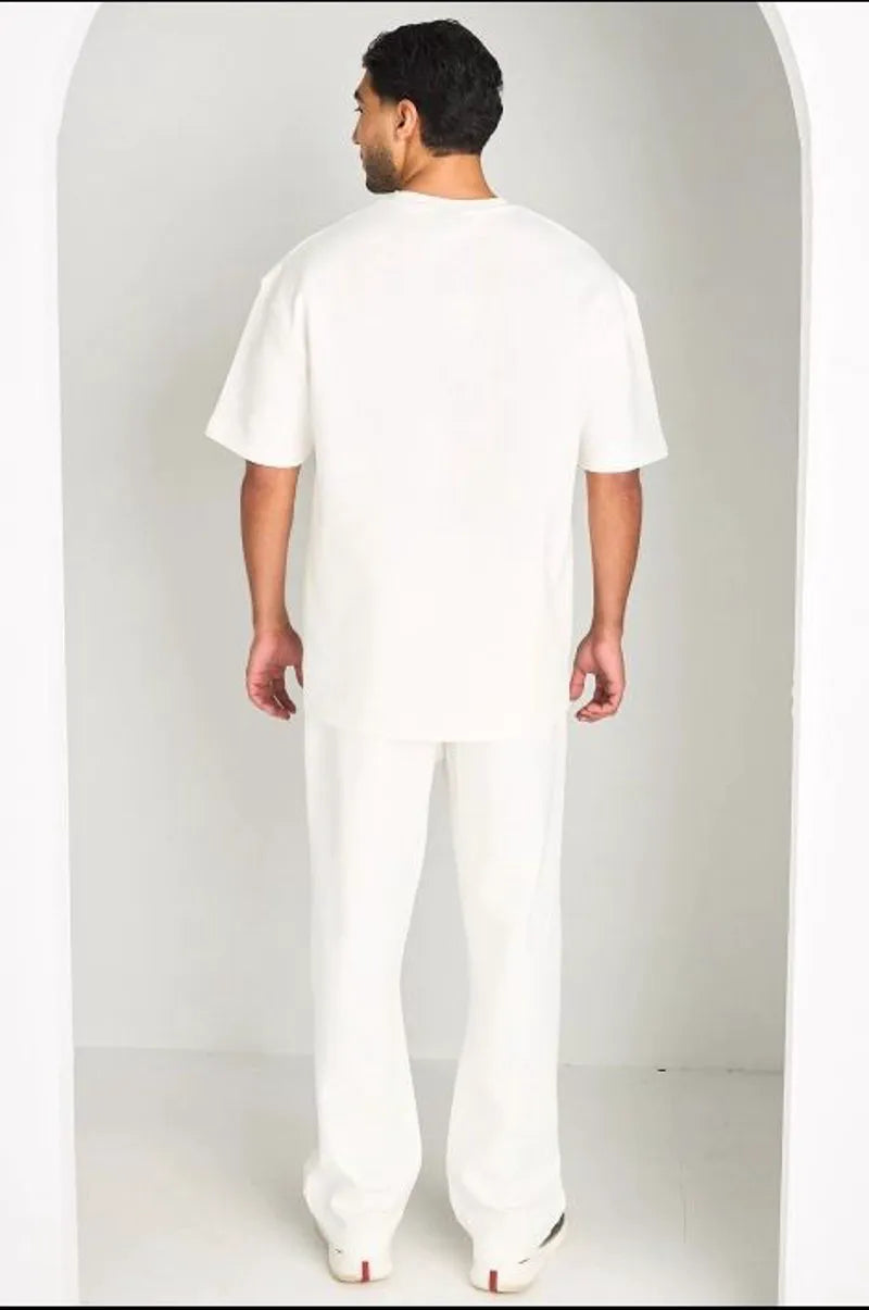 Ensemble blanc haut + pantalon avec broderies