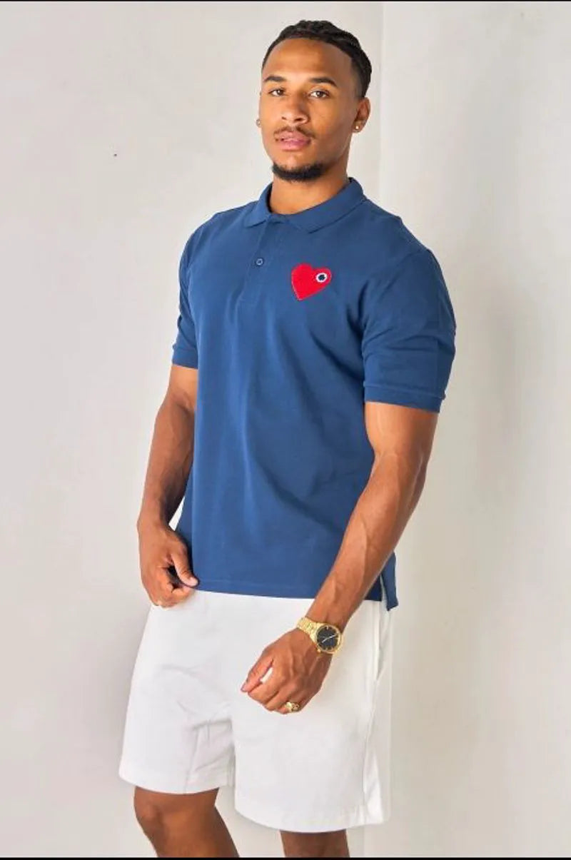 Navy blue polo with heart patch