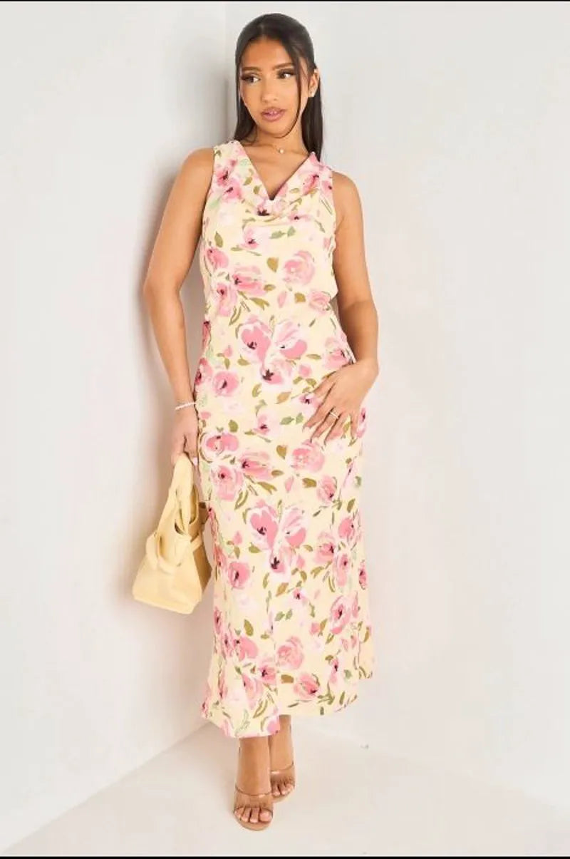 Robe longue jaune à col bénitier et motifs floraux