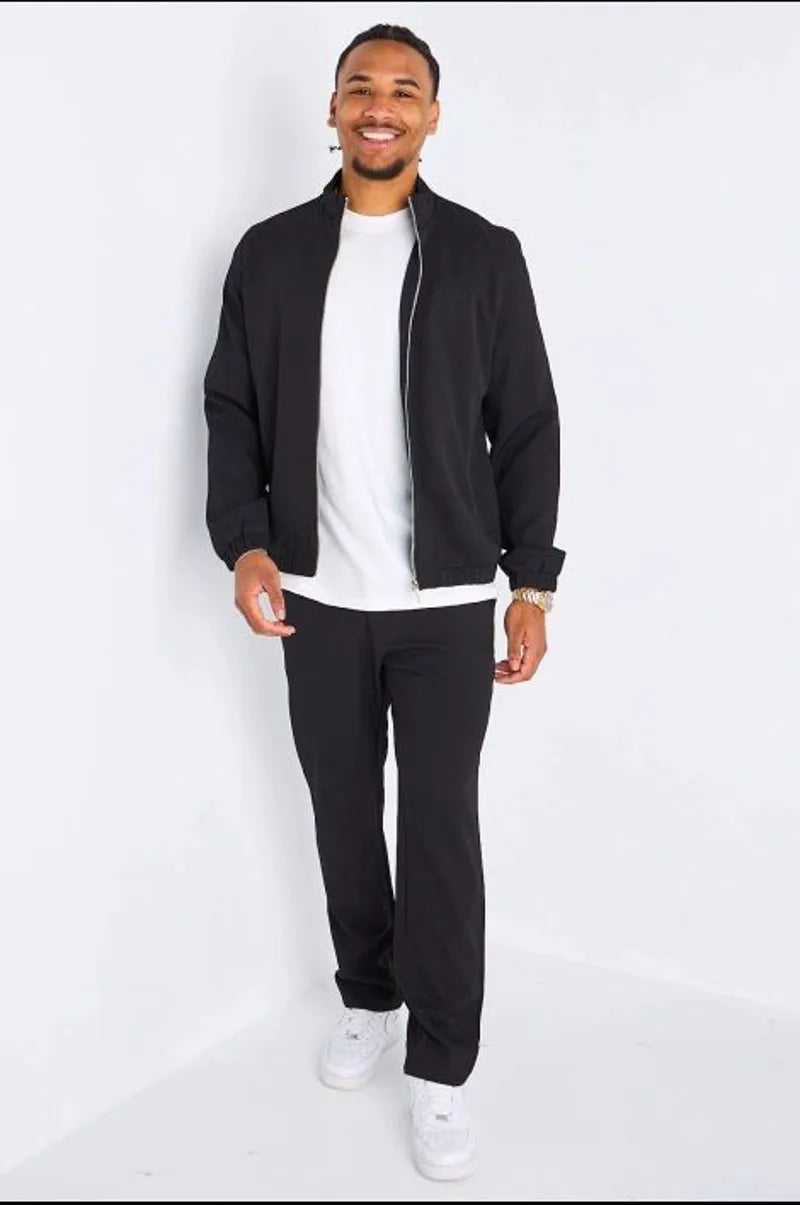 Ensemble deux pièces noir veste à col rond et manches longues + pantalon coupe droite