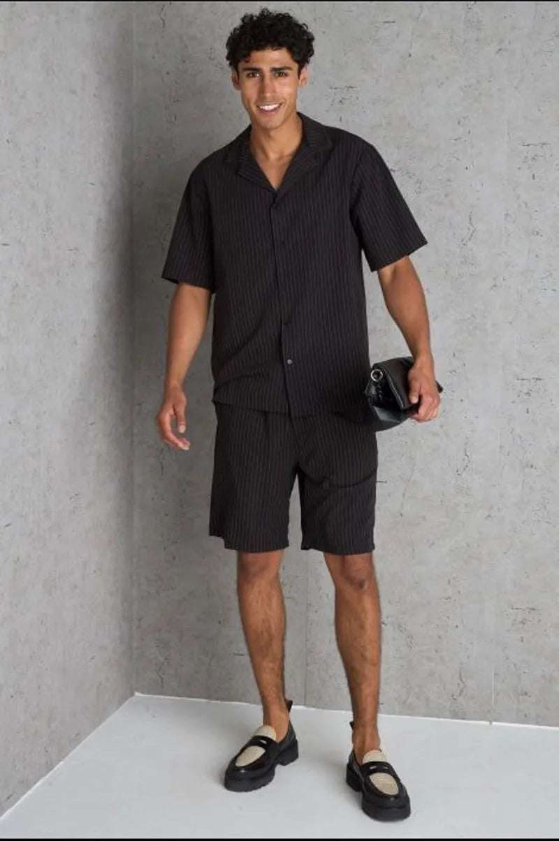 Two-piece set: black striped shirt and shorts