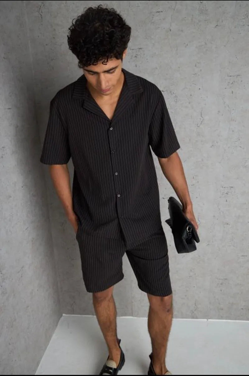 Two-piece set: black striped shirt and shorts