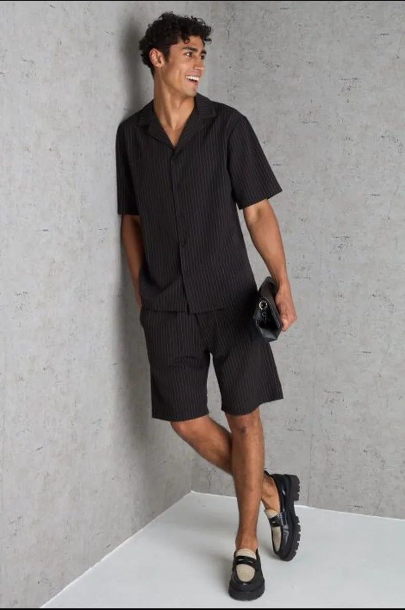 Two-piece set: black striped shirt and shorts