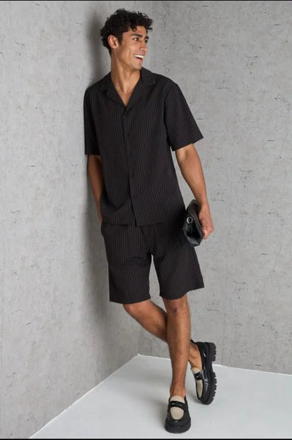 Two-piece set: black striped shirt and shorts