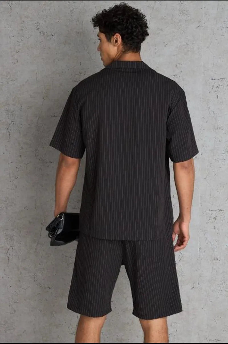 Two-piece set: black striped shirt and shorts