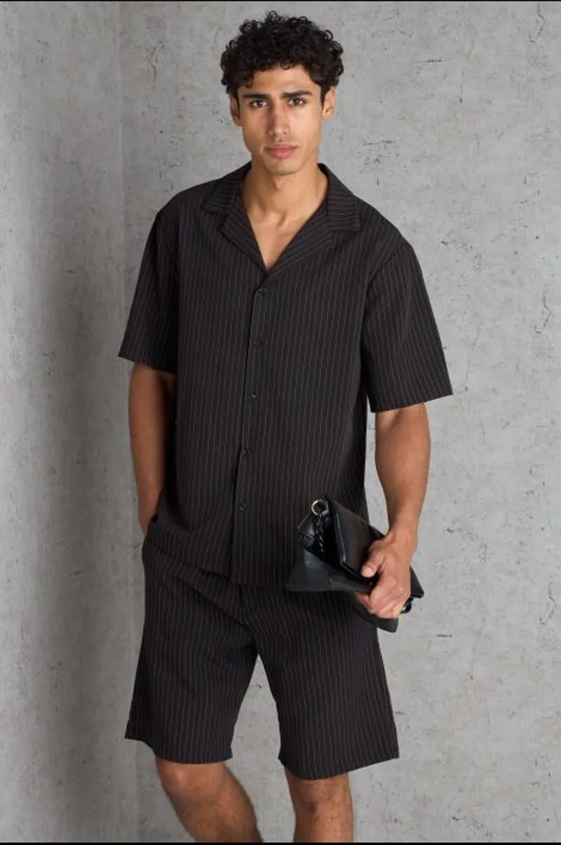 Two-piece set: black striped shirt and shorts