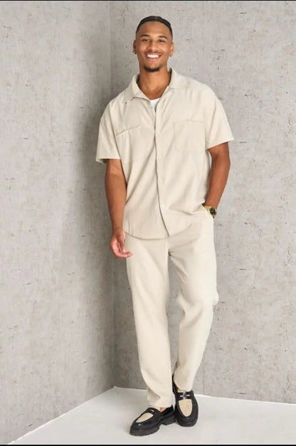 Two-piece ensemble: beige shirt and trousers