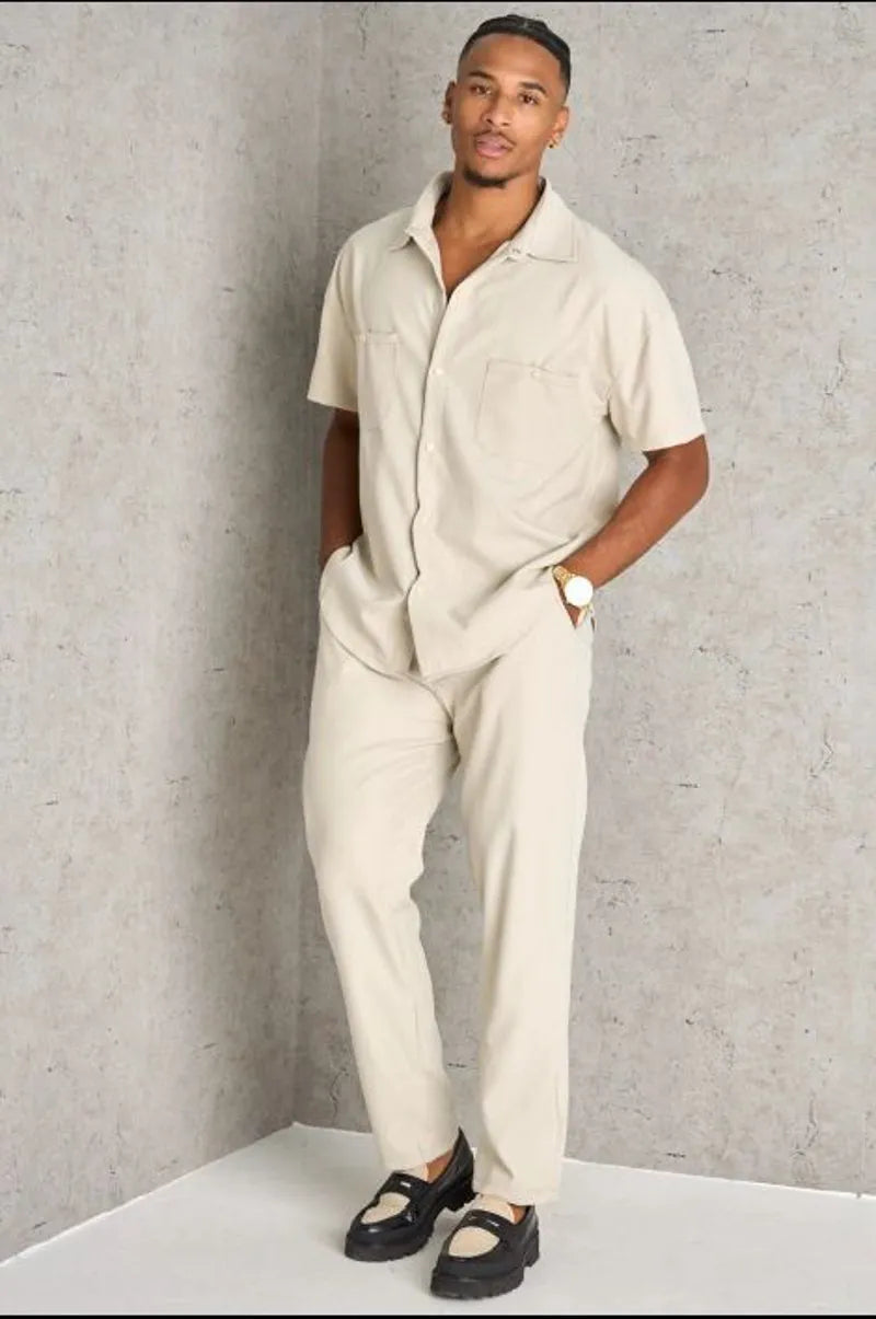 Two-piece ensemble: beige shirt and trousers