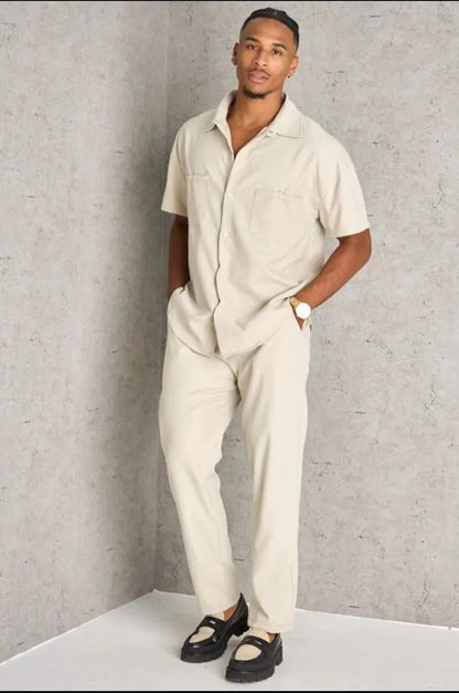 Two-piece ensemble: beige shirt and trousers