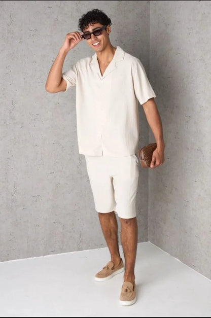 Two-piece ensemble: textured beige shirt and shorts