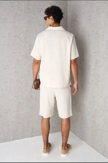 Two-piece ensemble: textured beige shirt and shorts