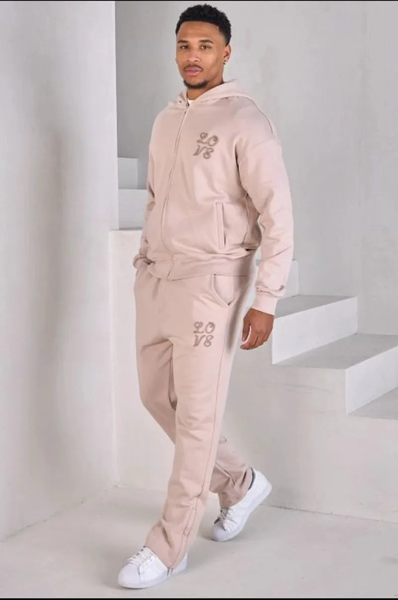 Two-piece set: beige zip-up sweatshirt and joggers