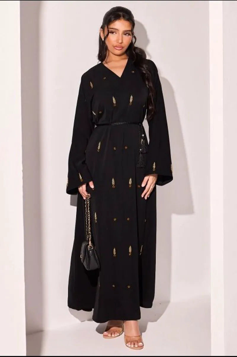 Abaya noire à strass dorés en forme de feuilles et fleurs