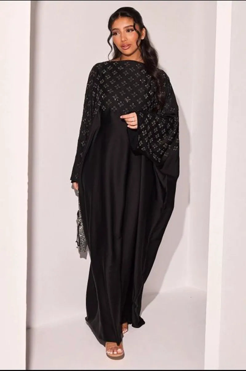 Abaya noire à strass en forme de fleurs argentées