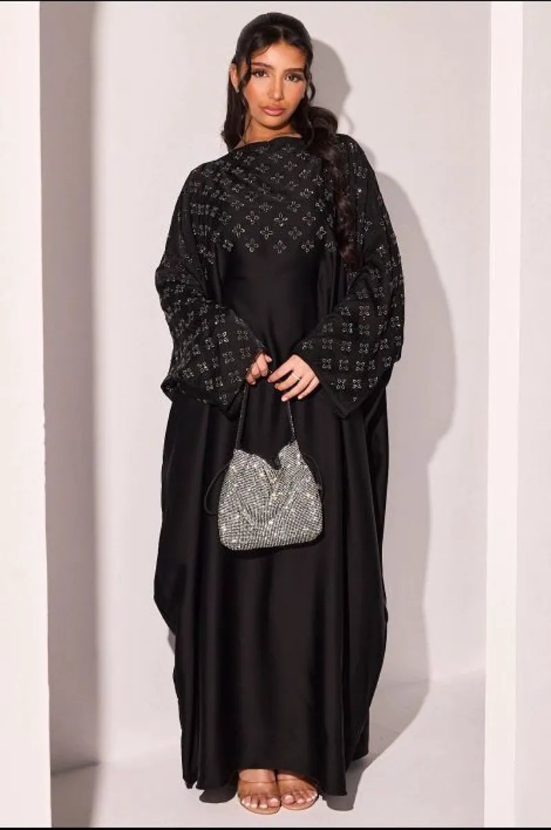 Abaya noire à strass en forme de fleurs argentées
