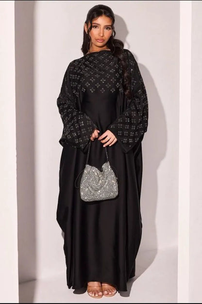 Abaya noire à strass en forme de fleurs argentées