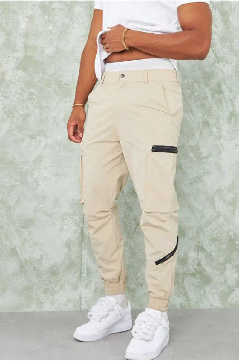 Beige canvas trousers with pockets