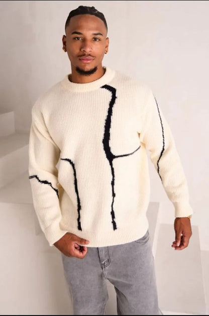 Beige knit sweater with black fuzzy panel