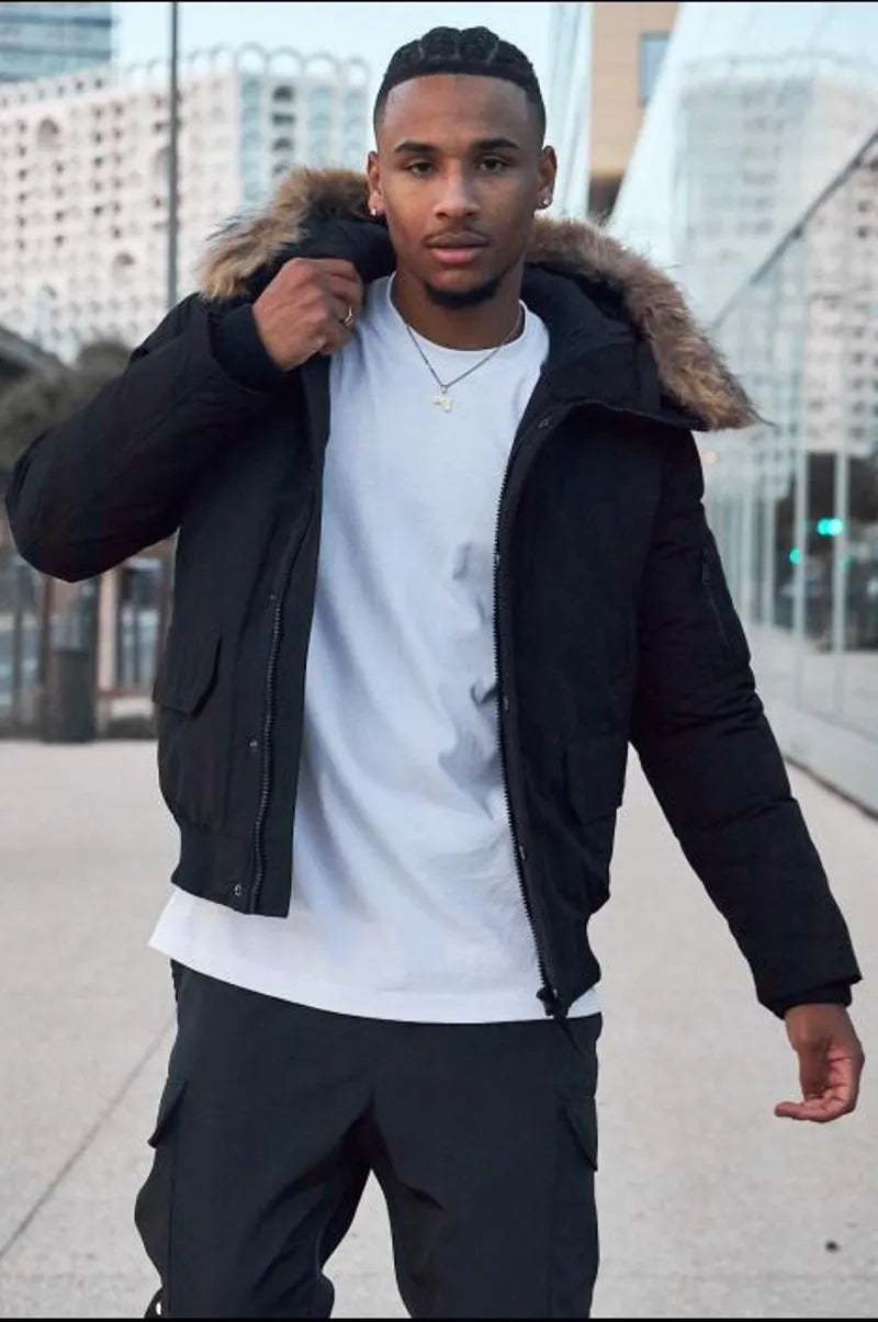 Black dual-material parka with fur-trimmed hood