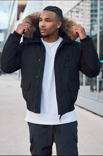 Black dual-material parka with fur-trimmed hood
