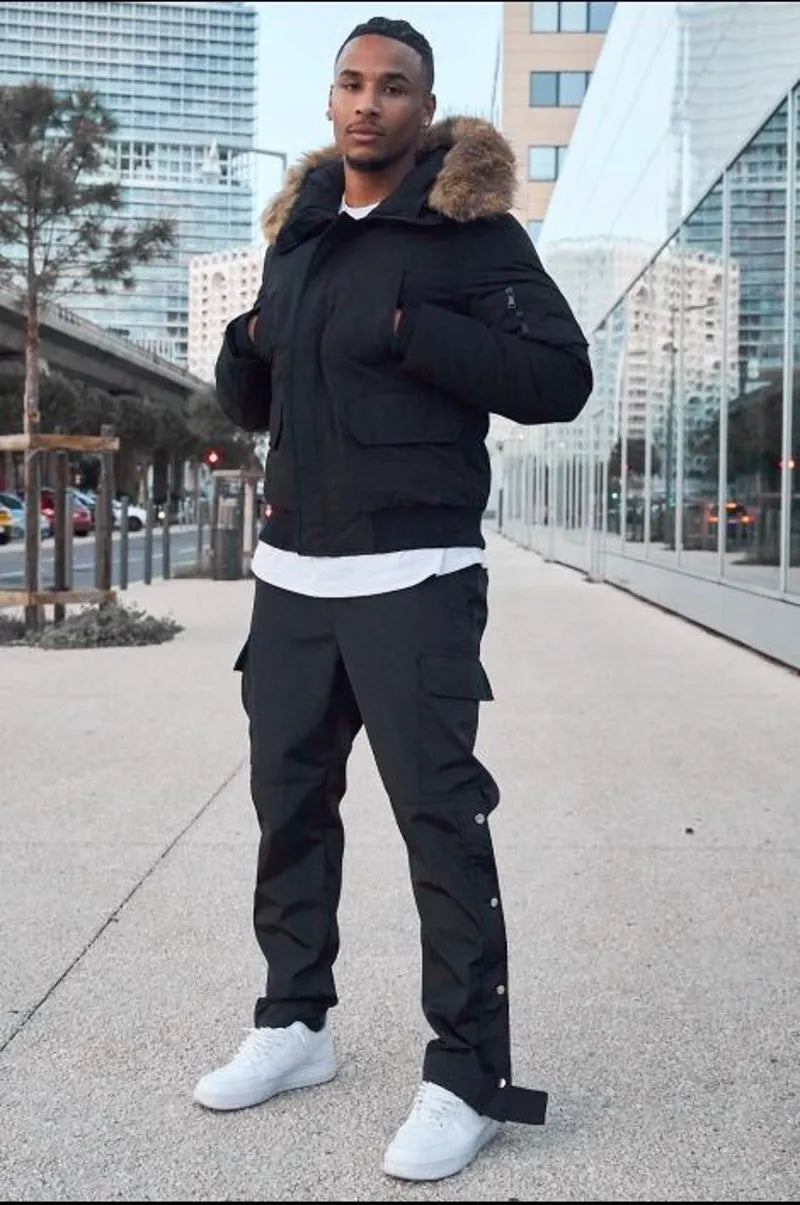 Black dual-material parka with fur-trimmed hood