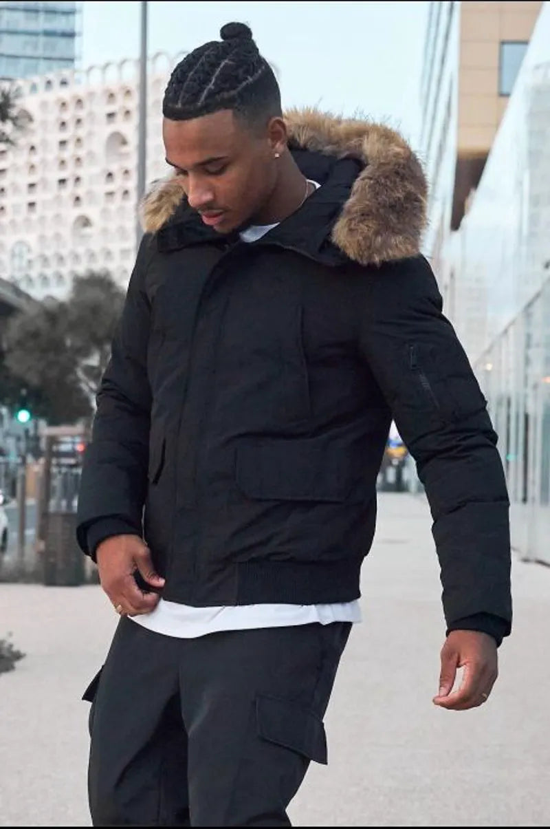 Black dual-material parka with fur-trimmed hood