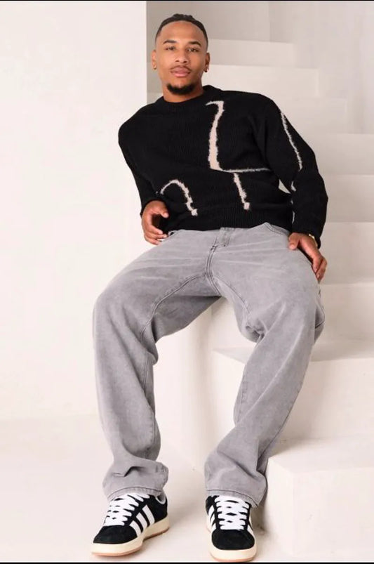 Black knit sweater with beige fluffy panel