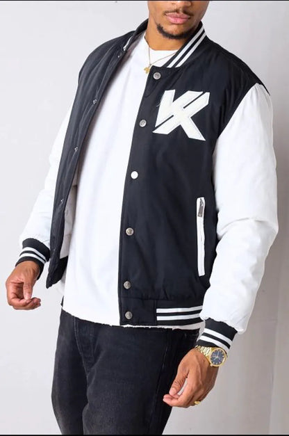 Short black and white quilted bomber jacket
