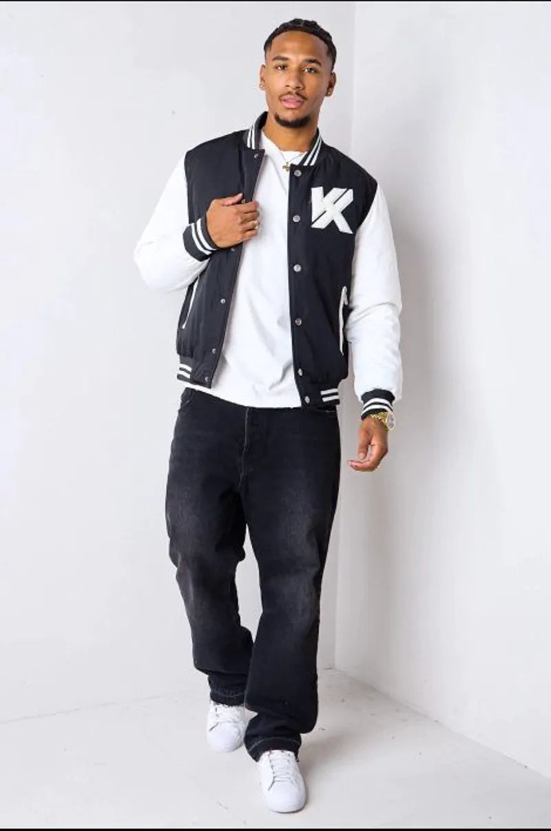 Short black and white quilted bomber jacket