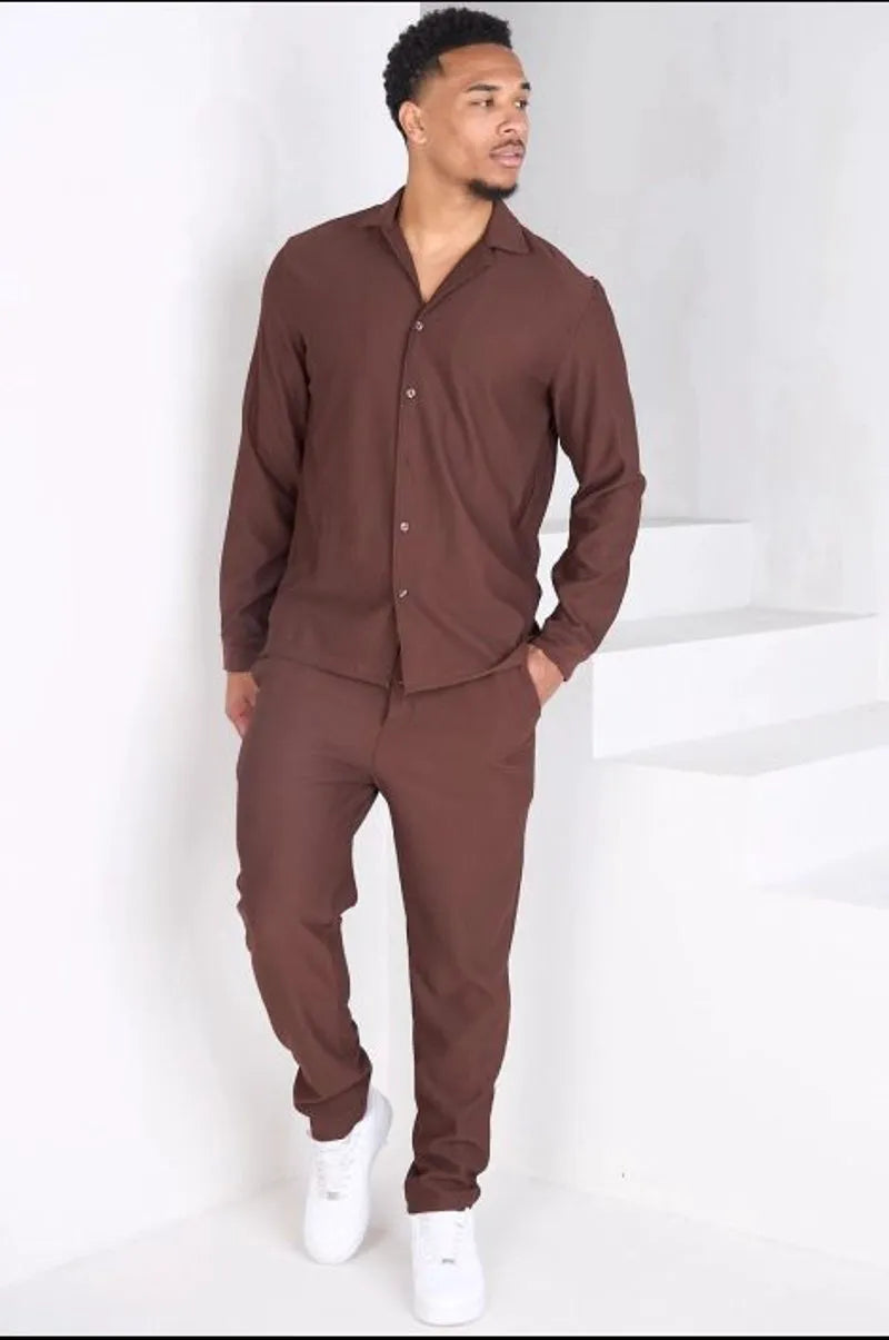 Two-piece ensemble: ribbed brown blouse and trousers