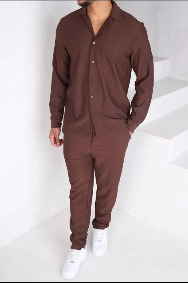 Two-piece ensemble: ribbed brown blouse and trousers