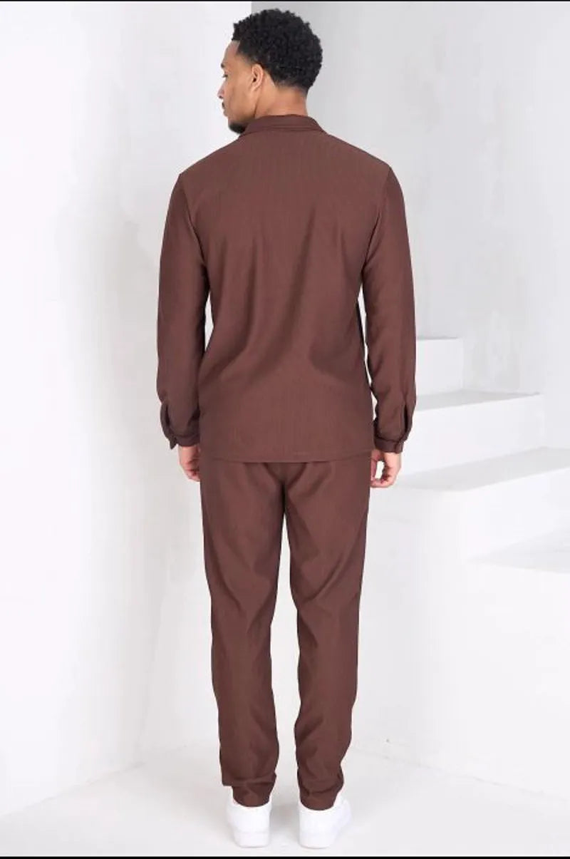 Two-piece ensemble: ribbed brown blouse and trousers