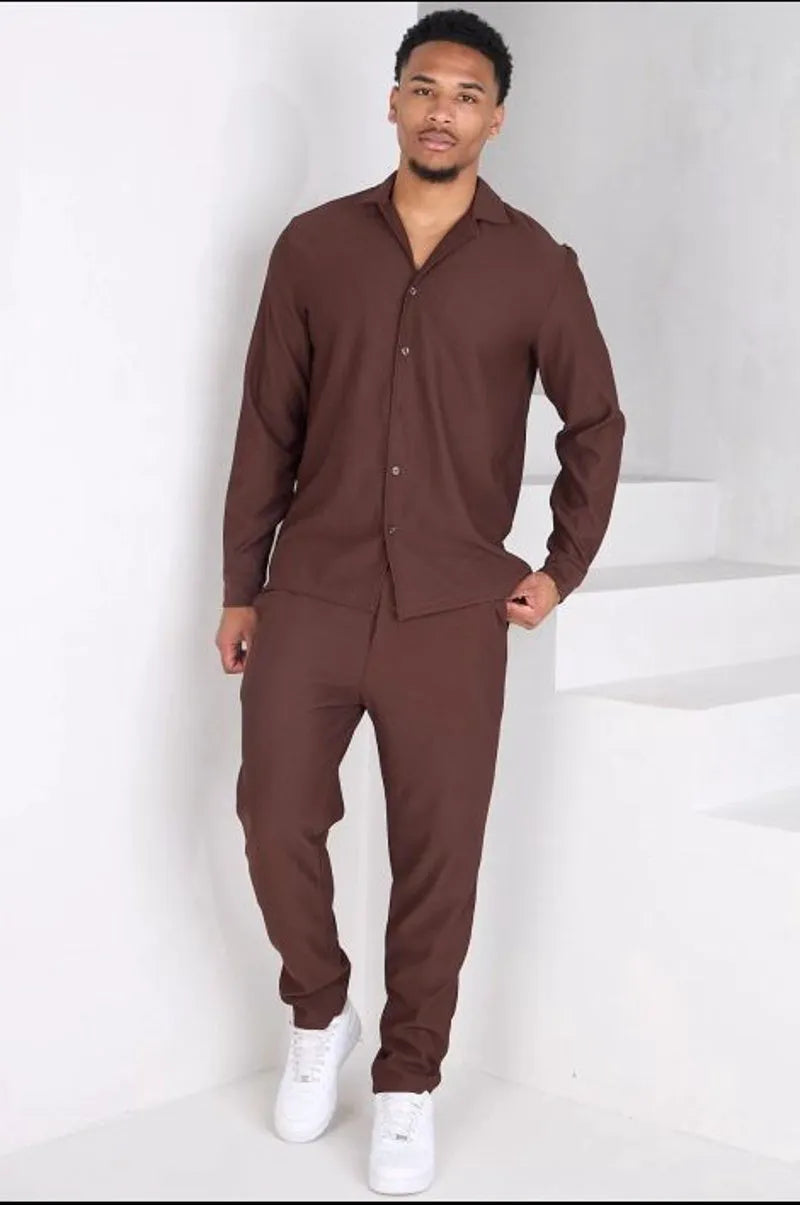 Two-piece ensemble: ribbed brown blouse and trousers