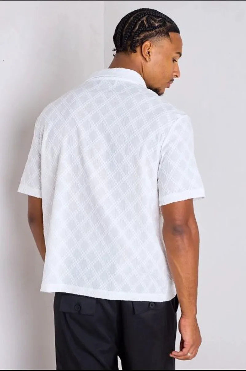 White openwork and textured blouse