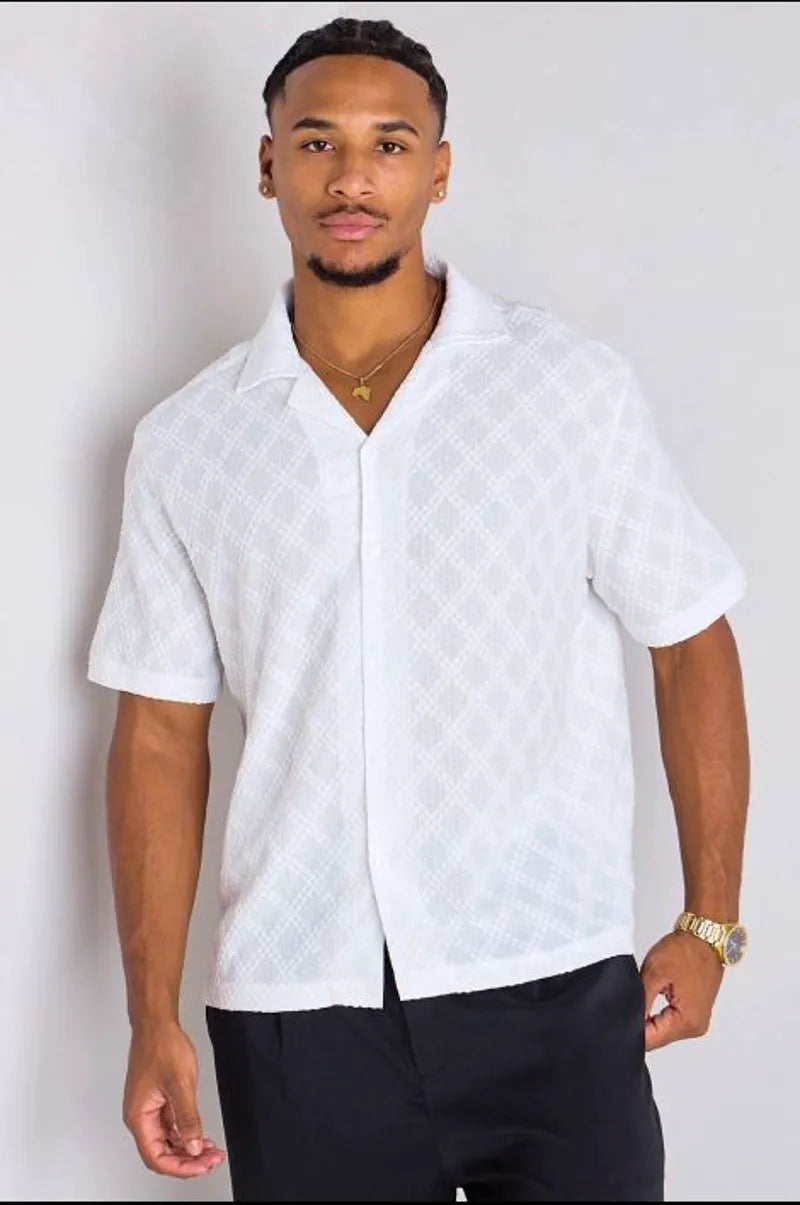 White openwork and textured blouse