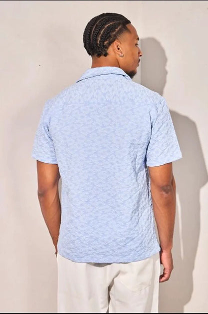 Light blue short-sleeve floral-patterned shirt
