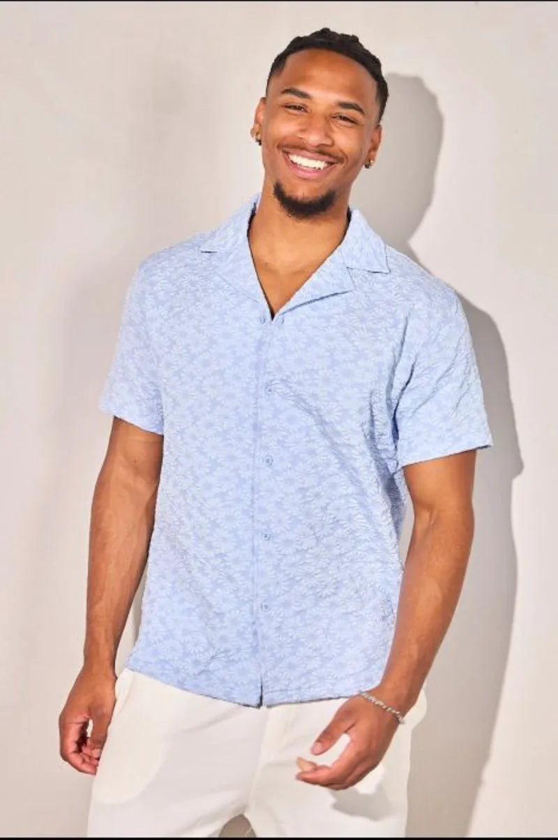 Light blue short-sleeve floral-patterned shirt