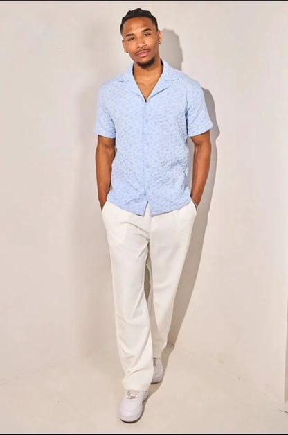 Light blue short-sleeve floral-patterned shirt