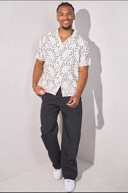 Beige linen shirt embroidered with blue leaves