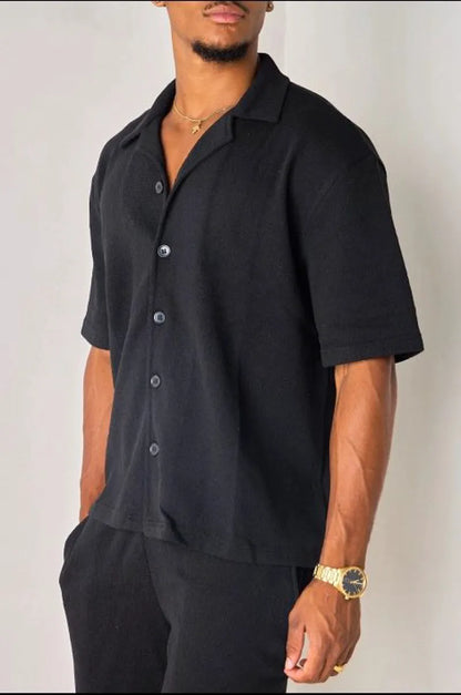 Black openwork shirt in textured fabric