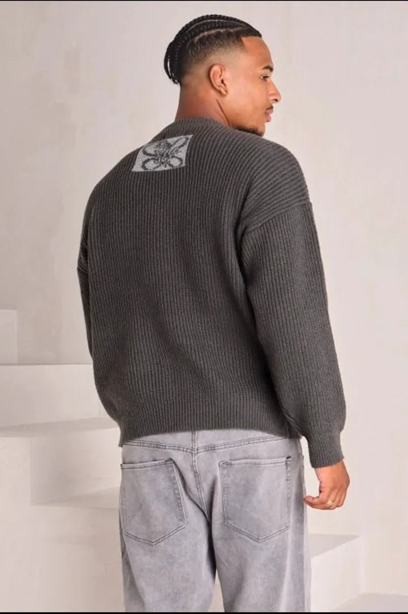 Dark gray knit sweater with logo on the chest and nape