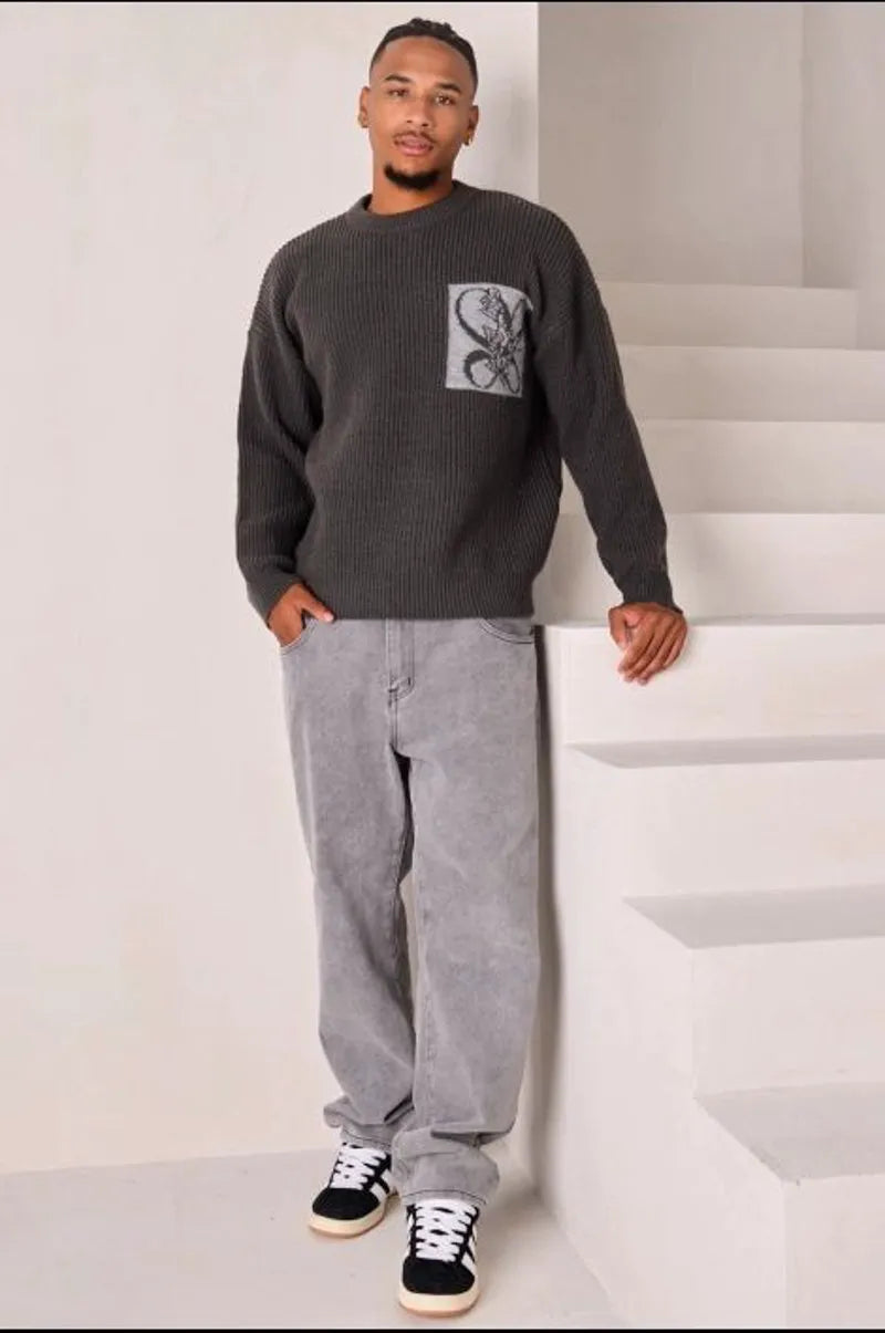 Dark gray knit sweater with logo on the chest and nape