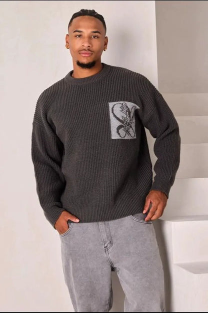 Dark gray knit sweater with logo on the chest and nape
