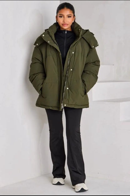Quilted green hooded down jacket