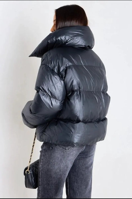 Black quilted short puffer jacket with a high collar