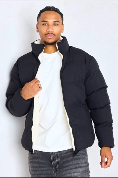 Reversible black down jacket with white shearling interior